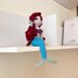 Mermaid sitting pose