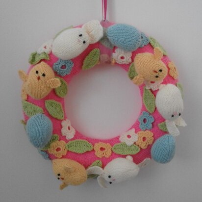 Knitted Easter wreath with chicks and bunnies