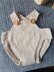 Knitted dolls romper