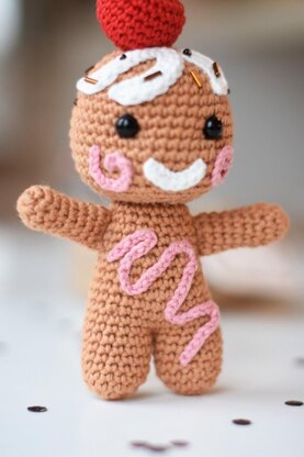Amigurumi gingerbread with a cherry on top