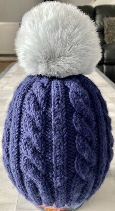 Cabled pompom hat