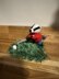 Mini Badger Playing Golf