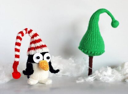 New Year Penguin in hat with Christmas tree