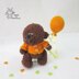 Bear with balloon