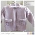 Child’s Cardigan with cable detail on sleeves and pockets - P065