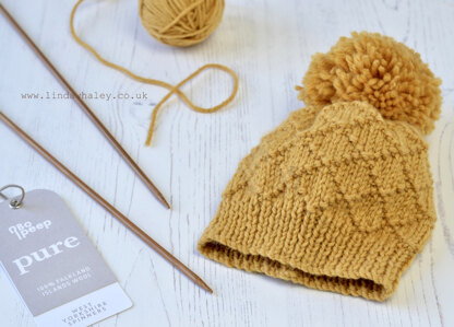 Jasper Simple Bobble Hat in WYS Bo Peep Pure