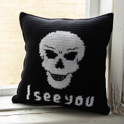 Pillow cover skull I See You Crochet pattern by Marika Uustare