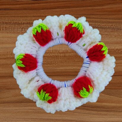 A Crochet Strawberry Scrunchie