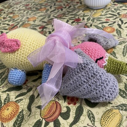 Adorable "Trumpetty Trunk" Crochet Elephant, mix-and-match your leftover yarn to make this pattern. Beginners pattern.