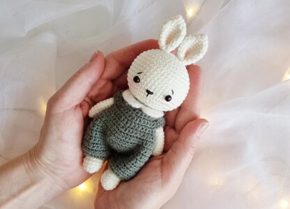 Crochet pattern little bunny toy in green jumpsuit