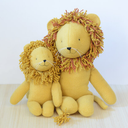 Stuffed cat and lion