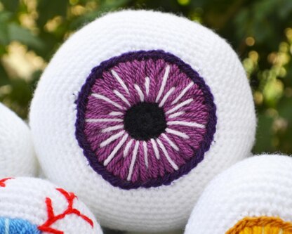 Crochet eyeballs. Creepy eyes. Halloween spooky eyes. Eyeball with blood vessels