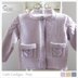 Child’s Cardigan with cable detail on sleeves and pockets - P065