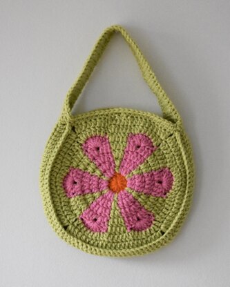 Crocheted mini flower bag Crochet pattern by Realm Designs | LoveCrafts