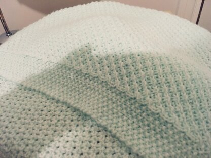 Mint green blanket using daisy stitch
