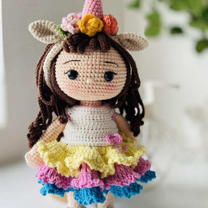 July - The unicorn doll