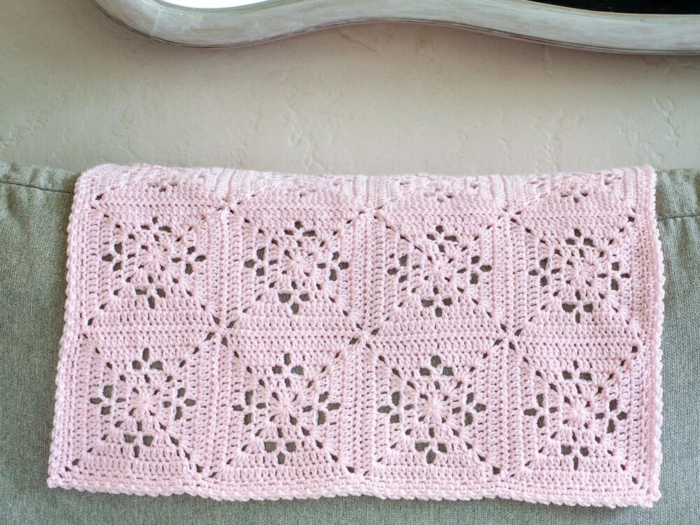 Delicate diamond motif filet crochet baby blanket