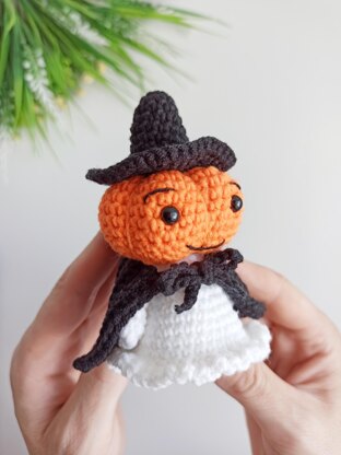 Halloween ghost with a pumpkin head