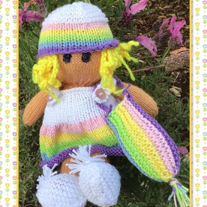 Doll knitting pattern with rainbow outfit.