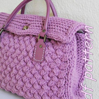 Textured bag knitted with woven pattern
