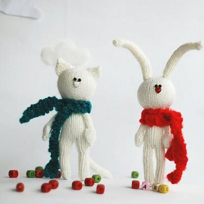White rabbit in the red scarf and White cat in the dark green scarf