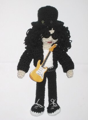 Amigurumi guitar player doll