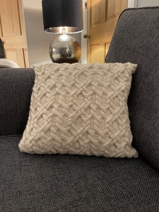 Cabled knitted cushions