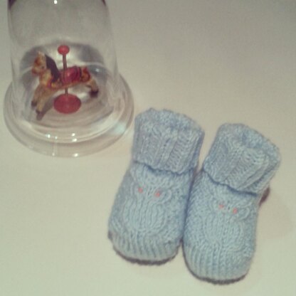 Baby booties with owl detail