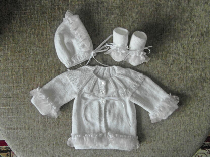 Hand knitted white baby girl set with pink organza ribbon