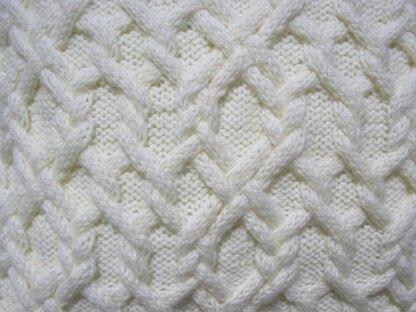 Cabled knitted cushions