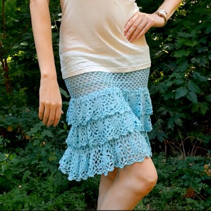 Crochet pin-up lacy ruffled skirt with mesh details.