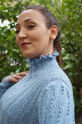 Ruffled neck cabled sweater