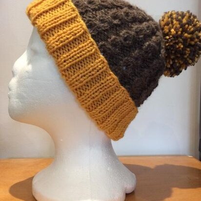 Cable bobble hat © Seashells Designs