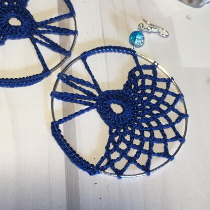 68. Asymmetric hoop earrings