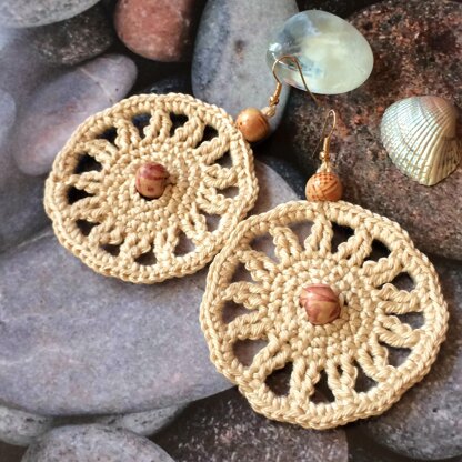 57. Celthic sun earrings