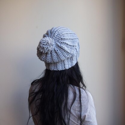 Slouchy hat with pom pom