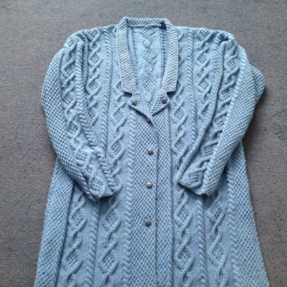 Moss stitch and cabled coat