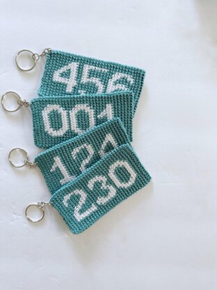 Squid Game inspired player numbers keychain