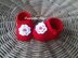 Red baby shoes with flower