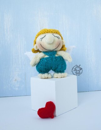 Small Cupid doll knitting flat