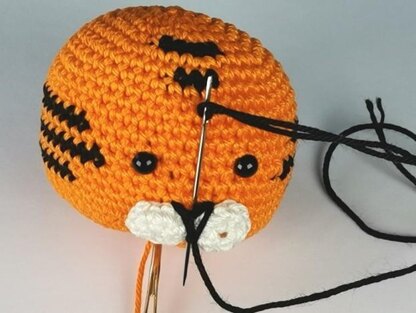 Tiger rattle