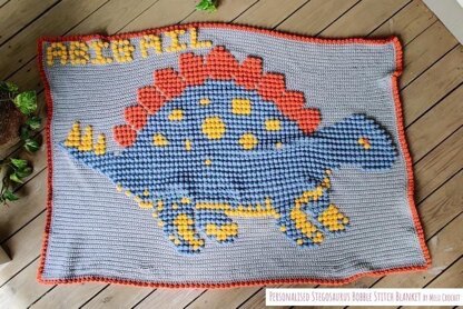 Personalised Stegosaurus Bobble Stitch Blanket by Melu Crochet