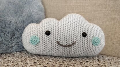 Cloud pillow and mobile with raindrops