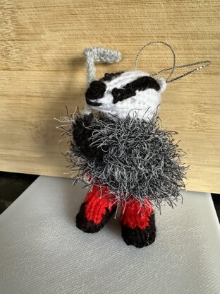 Mini Badger Playing Golf