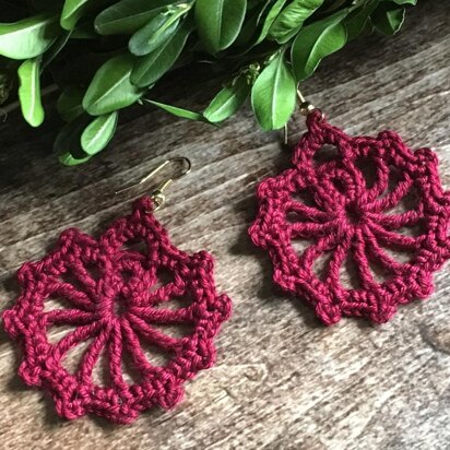 112. Burgundy round earrings