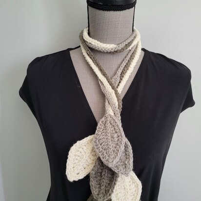 Scarf from leaves and cords