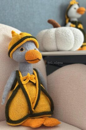 Knitting toy clothes for goose