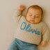 Baby sweater with name