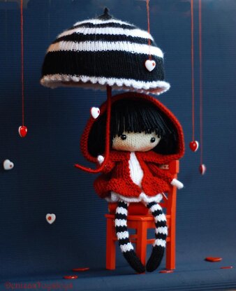 Eugene. The Doll in striped stockings with big umbrella.