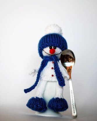 Lovely and sweet Snowman in the blue hat and scarf for keeping warm breakfast egg